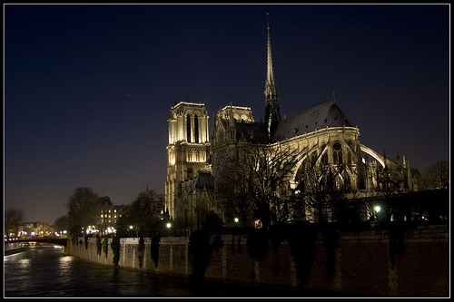 Notre Dame de Paris shimmers on a December night.