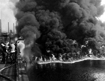 Be not deceived. This isn't 1969, or you'd see psychedelic colors. This is the Cuyahoga River fire on Nov. 3, 1952. I haven’t found a good image from 1969, which was a flash in the pan by comparison. [Source: Cleveland State University Library/Ohio History Central]