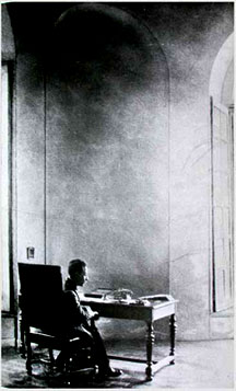 Rainier Maria Rilke works at his writing desk in the Hôtel Biron, Paris