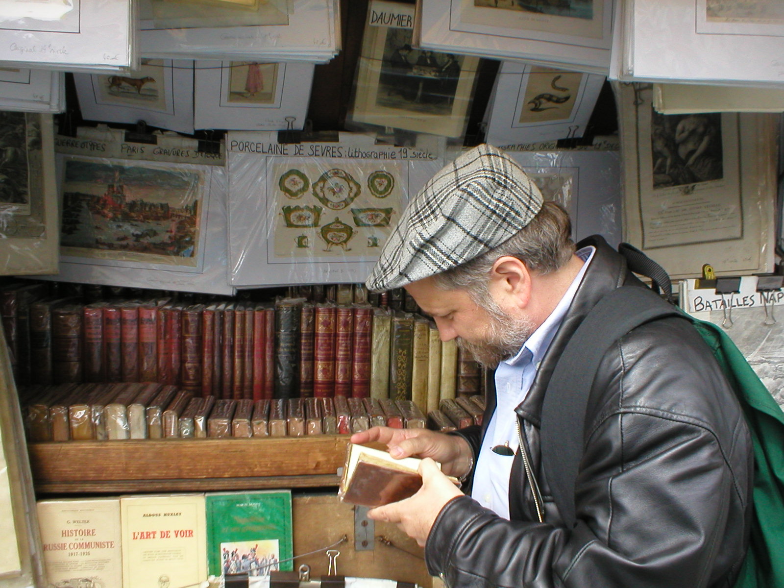 A blind flaneur peruses an edition of Voltaire printed in 1745.