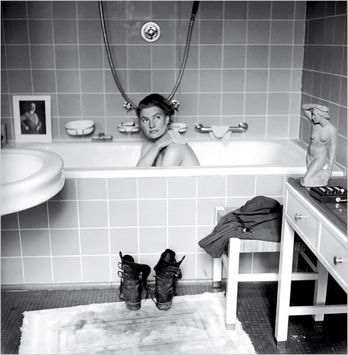 Lee Miller sneaks a bath in Hitler’s apartment after the fall of Berlin, 1945; photo by David E. Scherman, Life magazine.