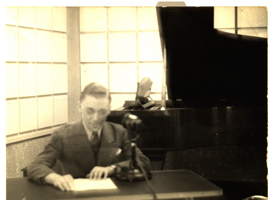 Broadcaster Lou Bourgeois prepares for woek in the studio of radio station CHAB in Moose Jaw, Saskatchewan circa 1937.